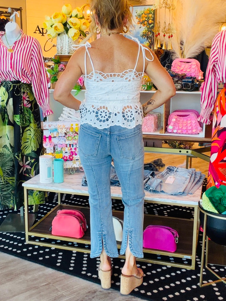EMBROIDERED EYELET PEPLUM TIE TOP