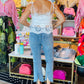 EMBROIDERED EYELET PEPLUM TIE TOP