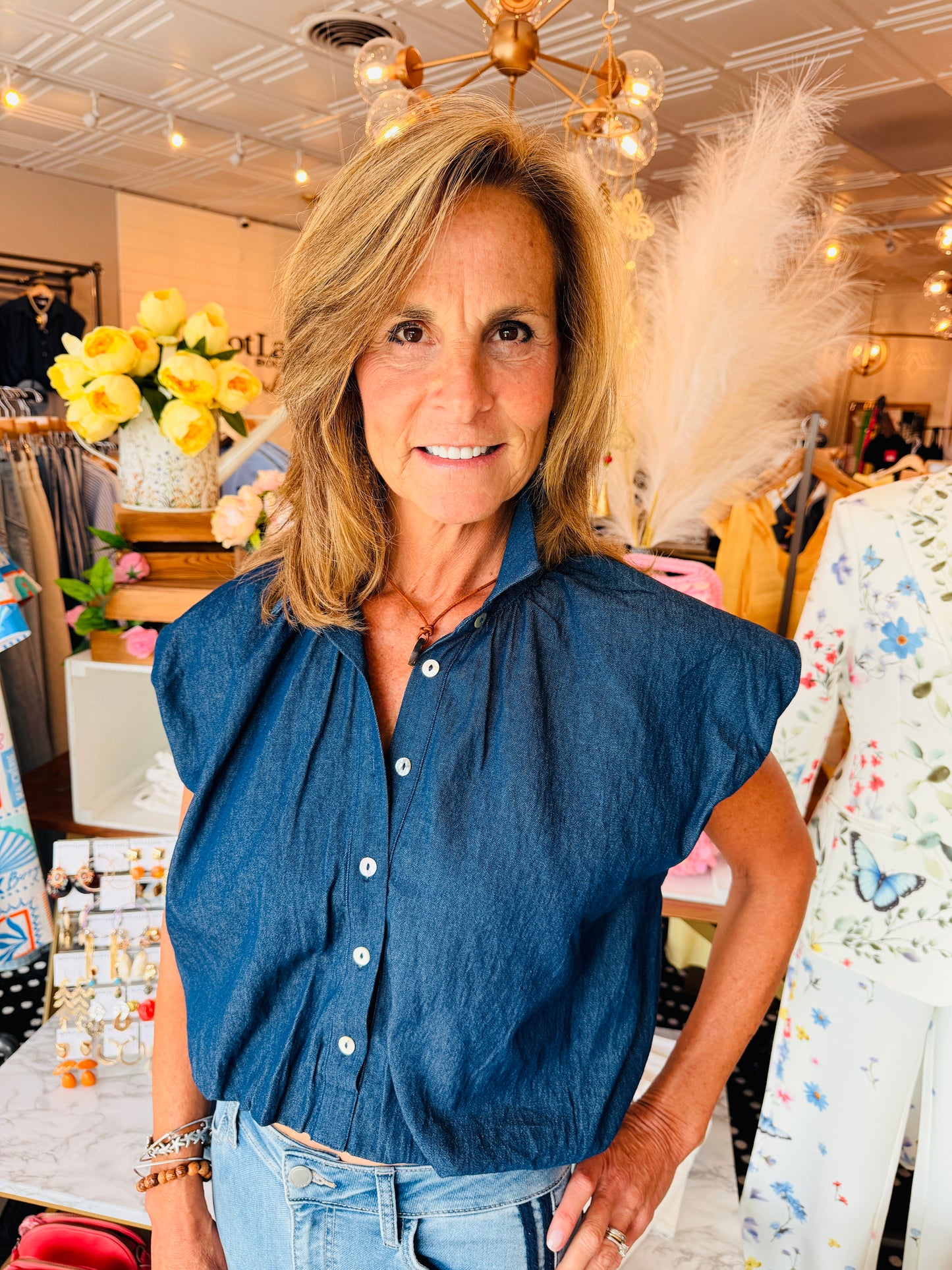 SLEEVELESS DENIM BUBBLE HEM TOP
