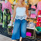 EMBROIDERED EYELET PEPLUM TIE TOP