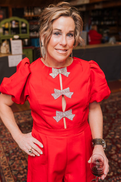 RHINESTONE BOW PUFF SLV ROMPER